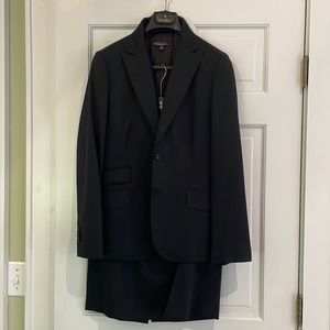 Classic women’s black Brooks Brothers suit - jacket and skirt combination.